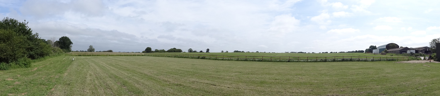 Panoramic view across the field with our 5 Caravan Pitches in Essex